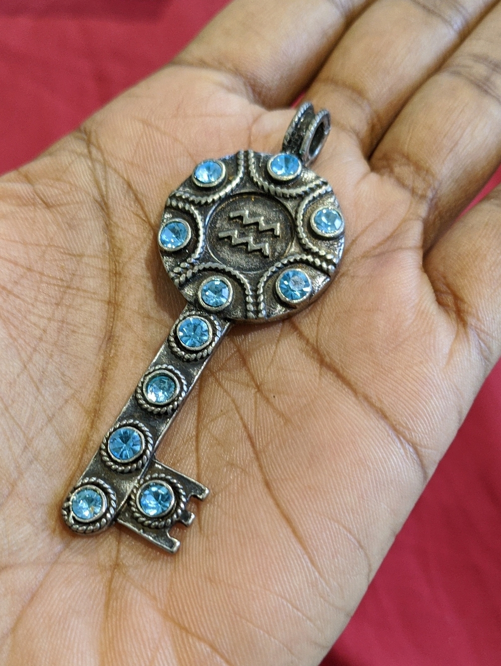 Aquarius Silver-Tone Key Pendant Necklace with Blue Crystal Accents